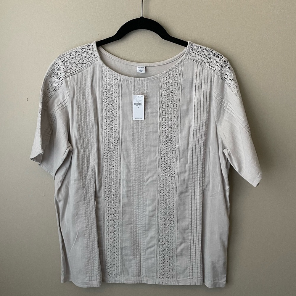 NWT Large cream short sleeve shirt with lace detail on front and sleeves